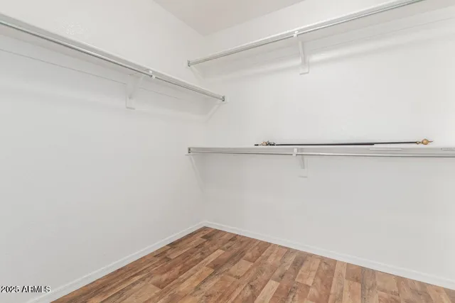 a view of a room with racks on the wall