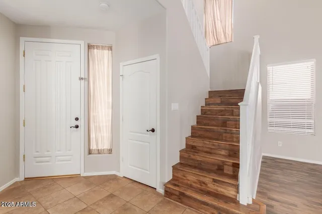 a view of an entryway with staircase