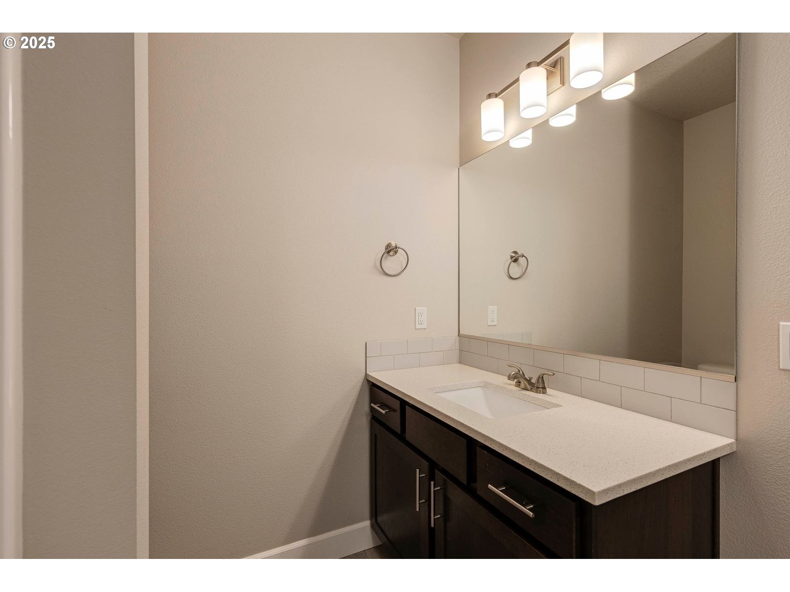 1099 Southeast Regan Hill Loop Estacada, OR 97023 - Photo 13 of 17 a bathroom with a sink and a mirror