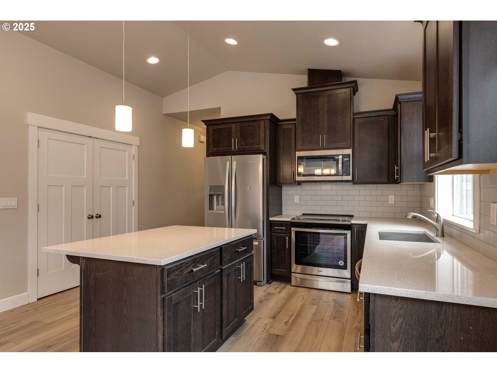 1099 Southeast Regan Hill Loop Estacada, OR 97023 - Photo 4 of 17 a kitchen with a sink appliances and cabinets
