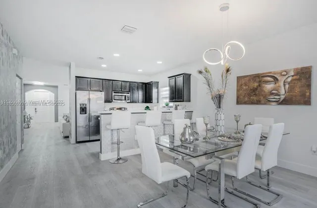 a view of a dining room with furniture
