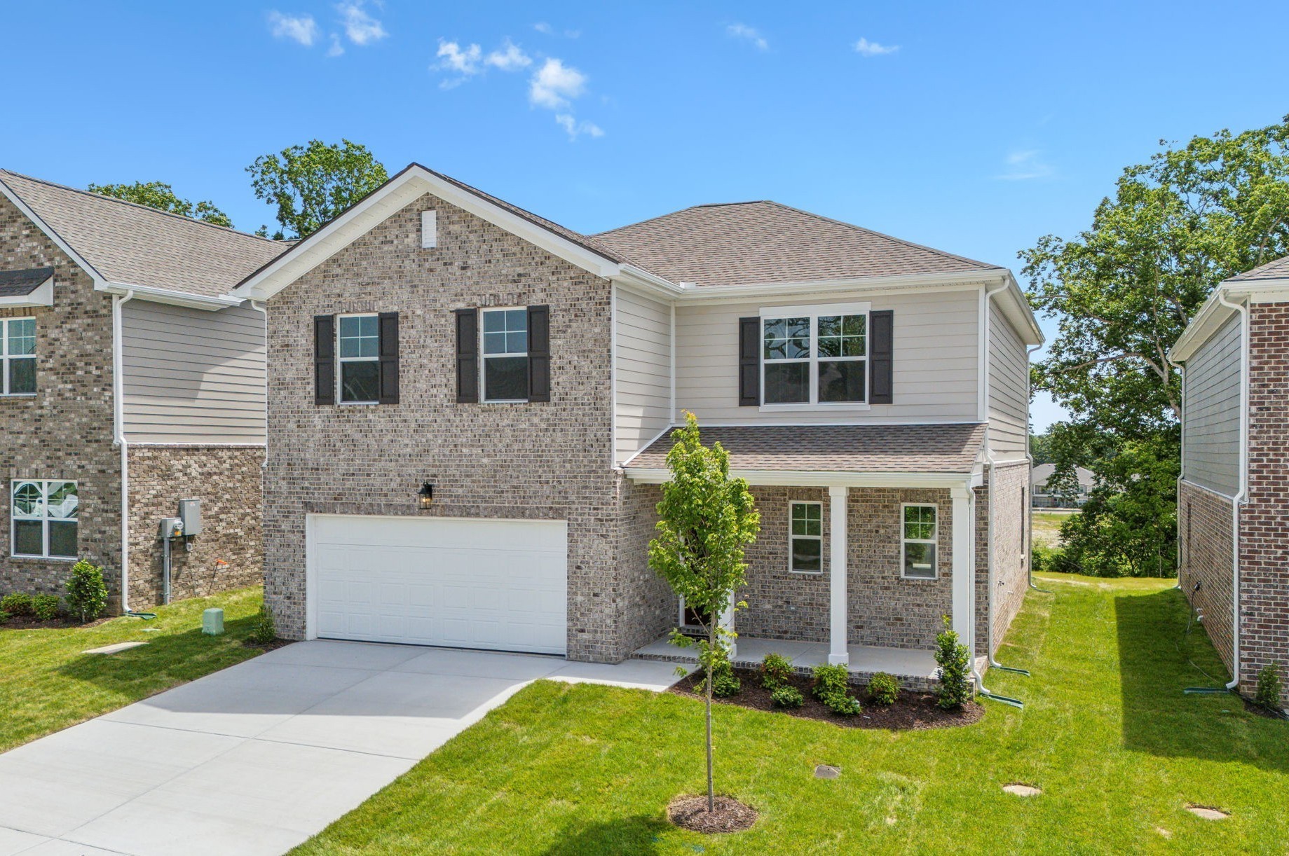 211 Limestone Way Mount Juliet, TN 37122 - Photo 2 of 35 a front view of a house with a yard and garage