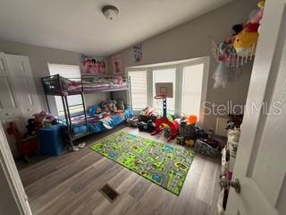 3431 Maple Drive Mulberry, FL 33860 - Photo 8 of 14 a view of a room with furniture and a fireplace