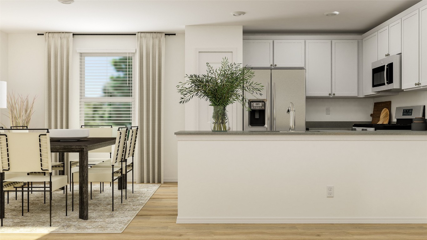 285 Keefer Kyle, TX 78640 - Photo 6 of 7 a view of kitchen with furniture and a potted plant