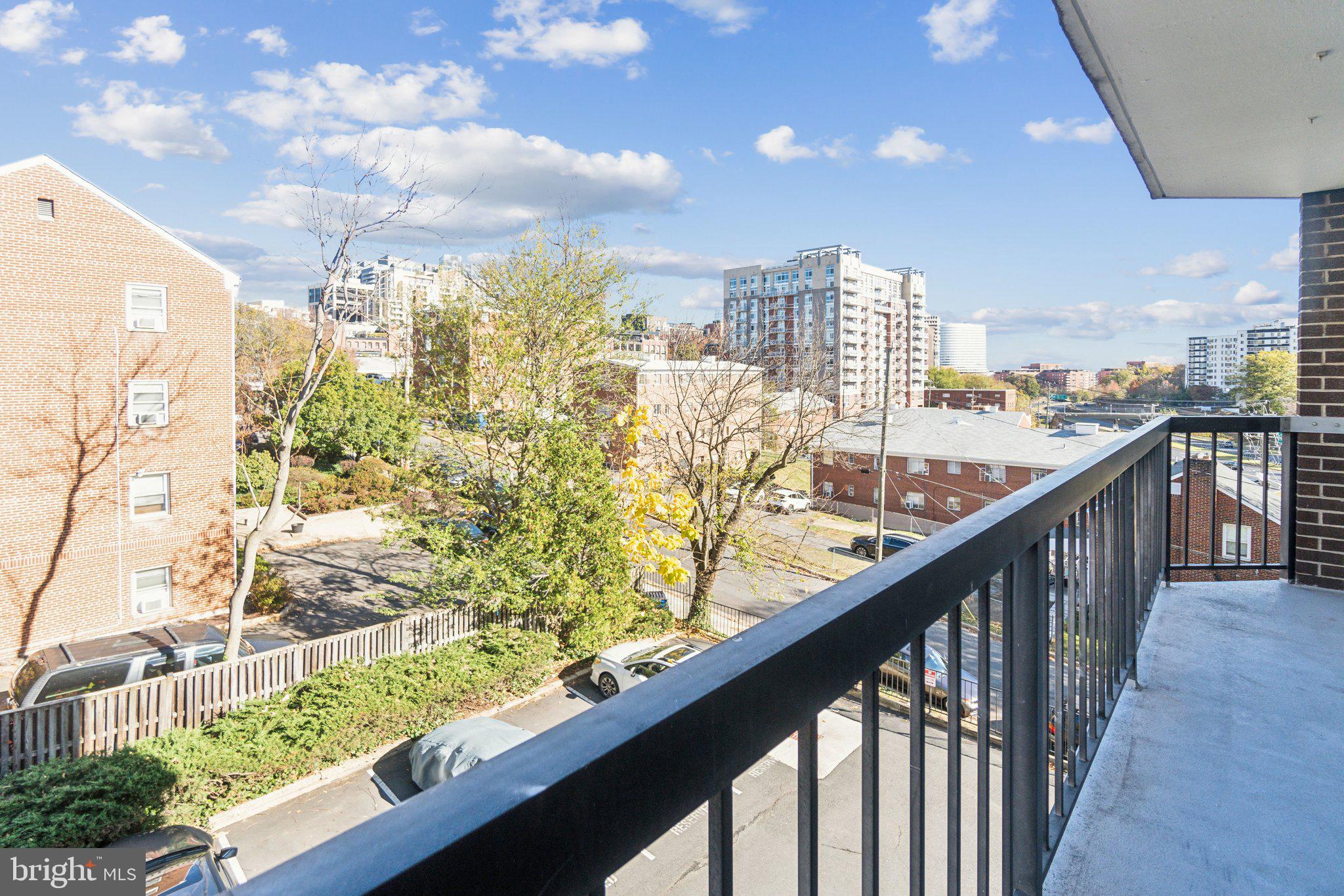 1401 North Rhodes Street, Unit 305 Arlington, VA 22209 - Photo 32 of 35 a view of a city from a balcony