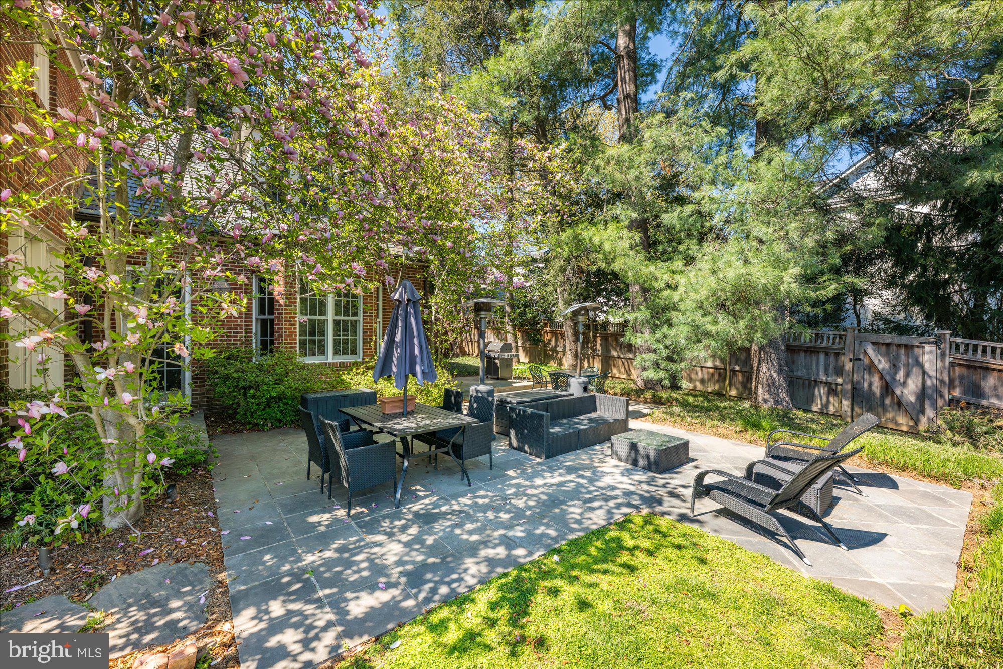 5225 Elliott Road Bethesda, MD 20816 - Photo 35 of 37 a view of a swimming pool with chairs in patio