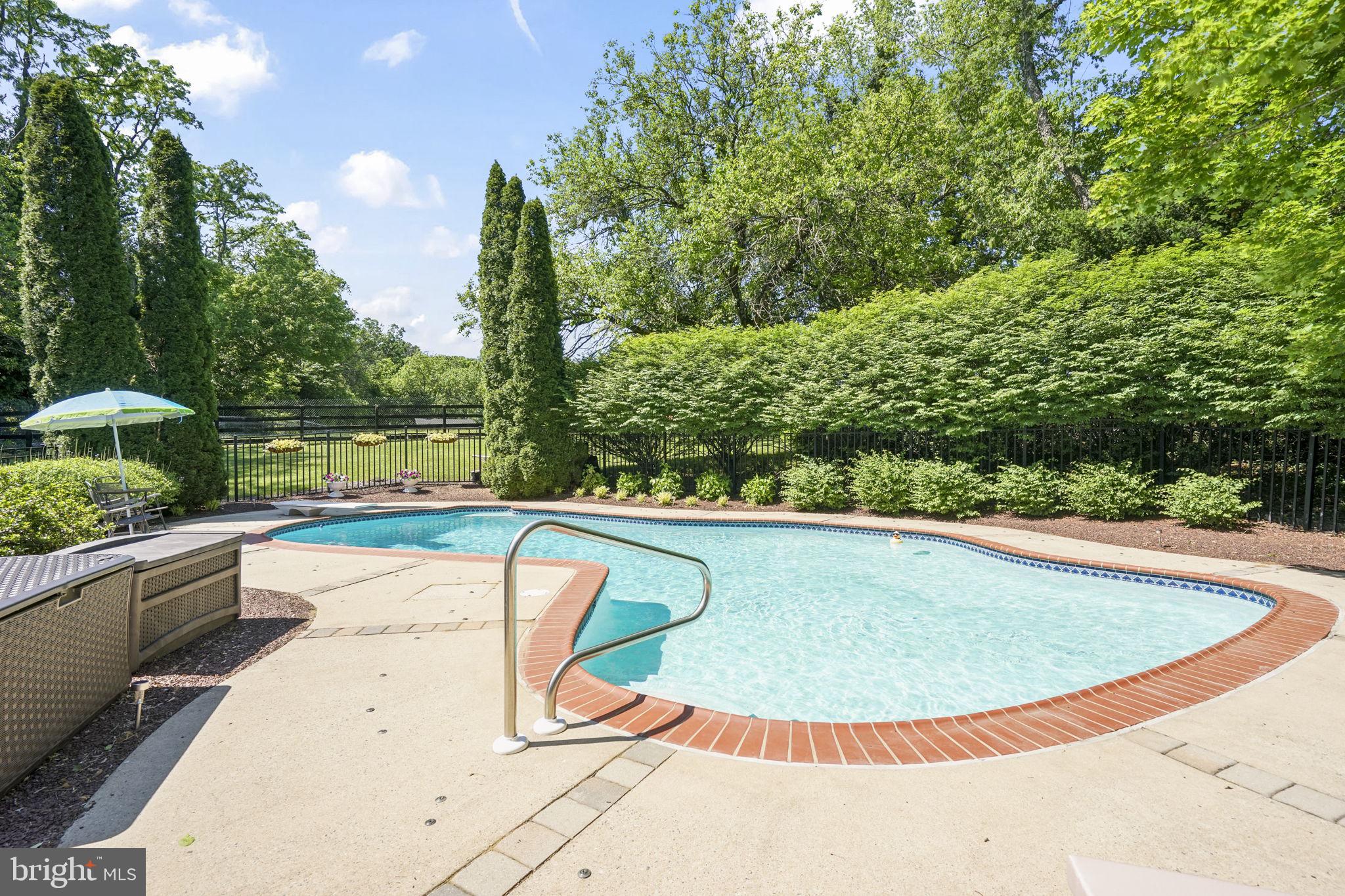 26 Ellisdale Road Allentown, NJ 08501 - Photo 42 of 45 Serene poolside retreat in nature.