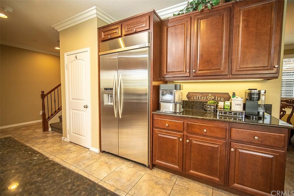 18622 Lurin Avenue Riverside, CA 92508 - Photo 13 of 33 a kitchen with stainless steel appliances granite countertop a refrigerator and a sink