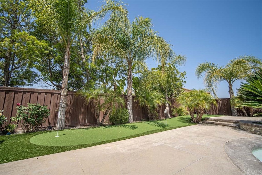 18622 Lurin Avenue Riverside, CA 92508 - Photo 32 of 33 a view of a yard with plants and trees