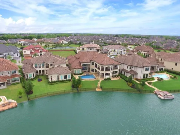 an aerial view of a house with a garden