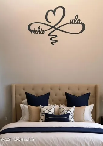 a bedroom with a bed and cabinets