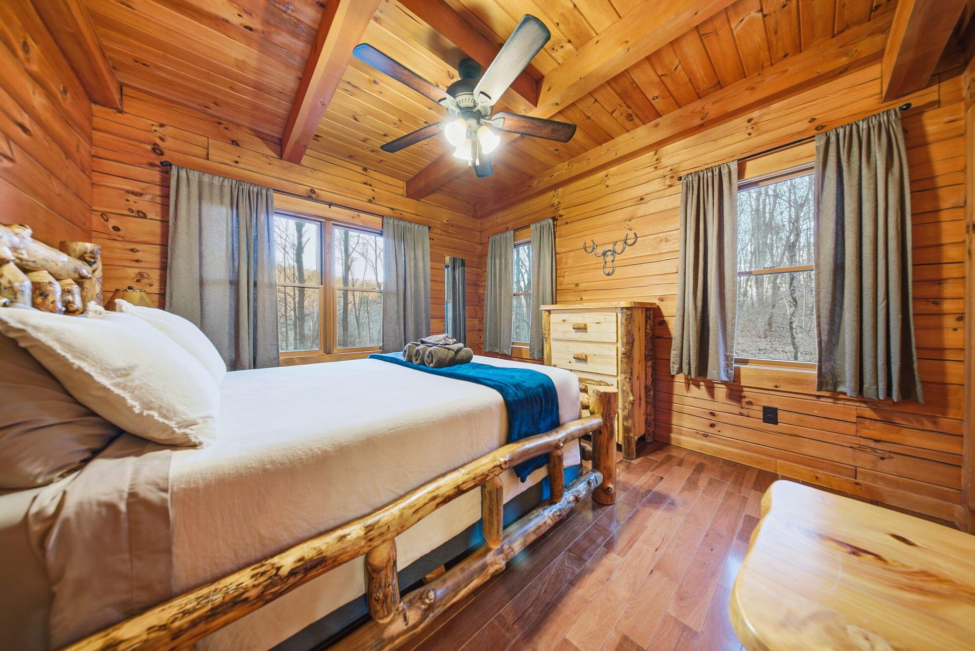15399 Clapper Hollow Road Laurelville, OH 43135 - Photo 21 of 61 Main Level Bedroom with a Queen Bed and Custom Log Furniture
