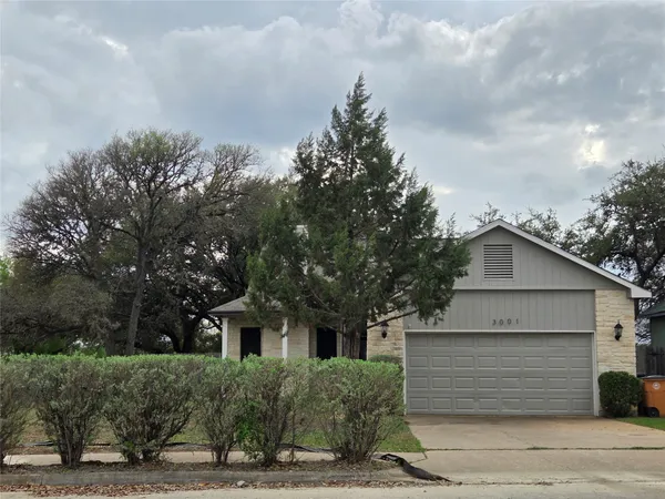 a view of outdoor space yard and front view of a house
