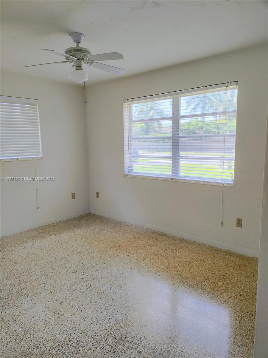 Kendall Miami, FL 33176 - Photo 11 of 28 an empty room with a window