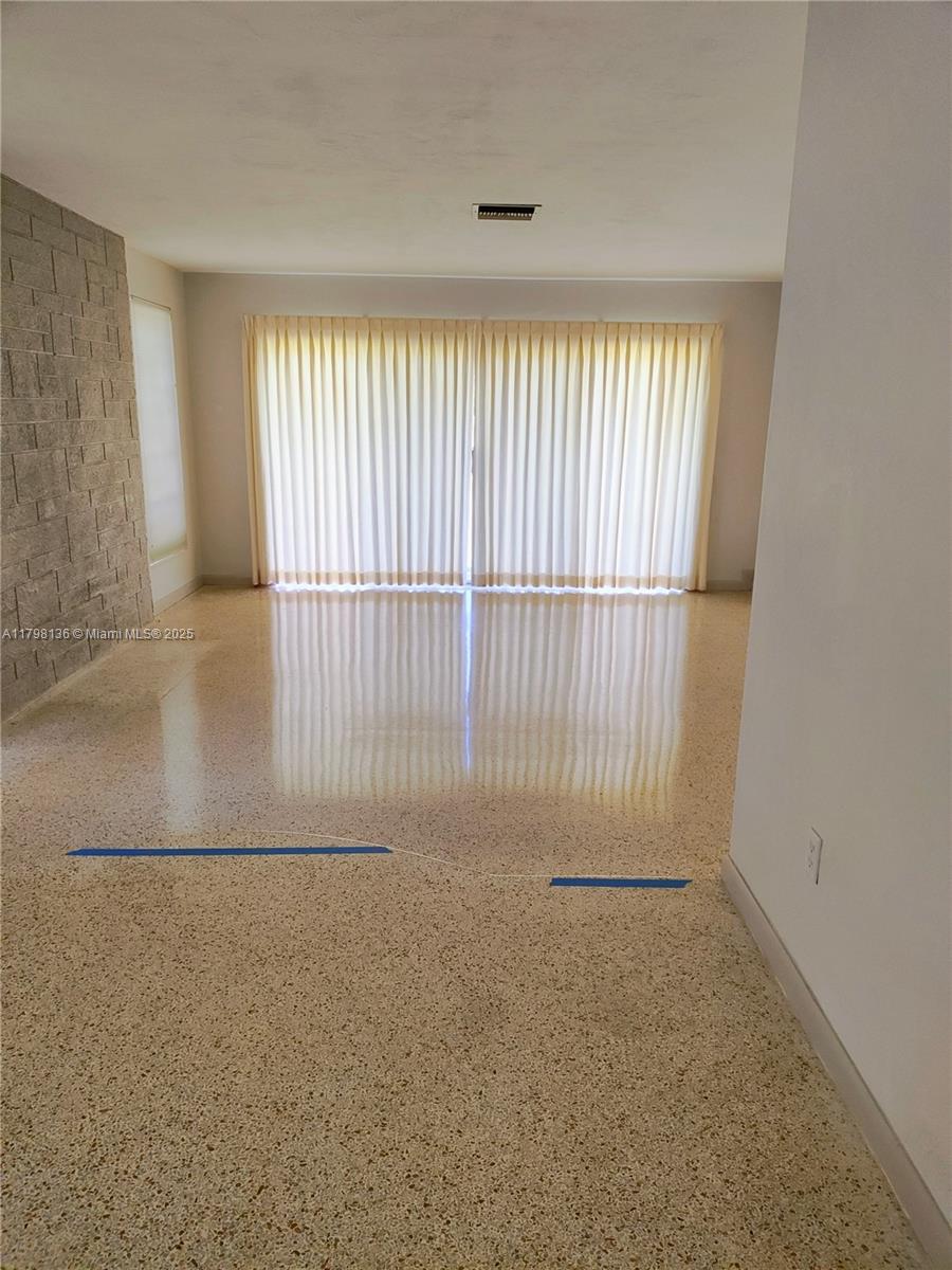 Kendall Miami, FL 33176 - Photo 23 of 28 an empty room with windows