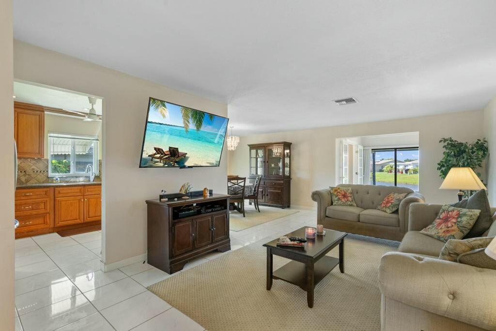6074 Lasalle Road Delray Beach, FL 33484 - Photo 10 of 37 Tiled living area