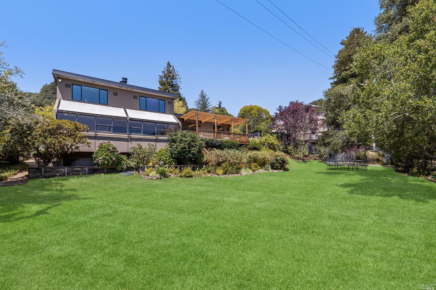22 Underhill Road Mill Valley, CA 94941 - Photo 1 of 1 a front view of house with yard and trees