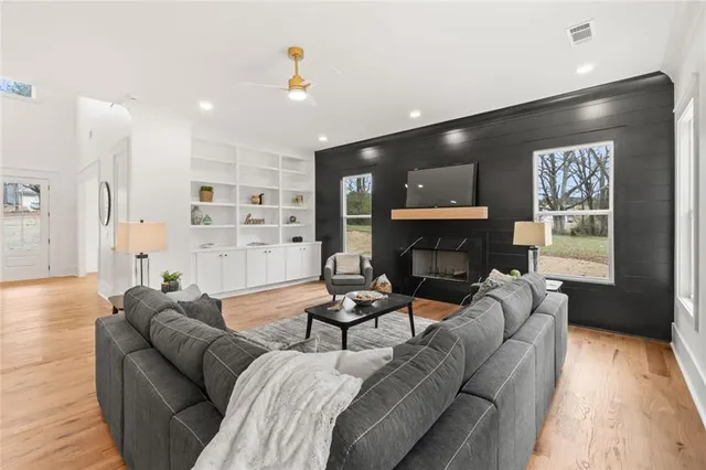 a kitchen with stainless steel appliances a refrigerator and cabinets