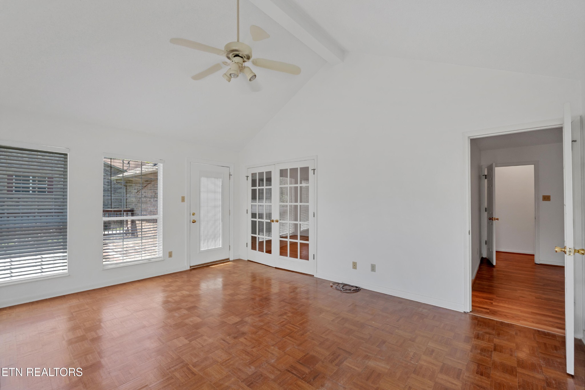 2036 Little Best Road Maryville, TN 37803 - Photo 16 of 54 wooden floor in an empty room with a window
