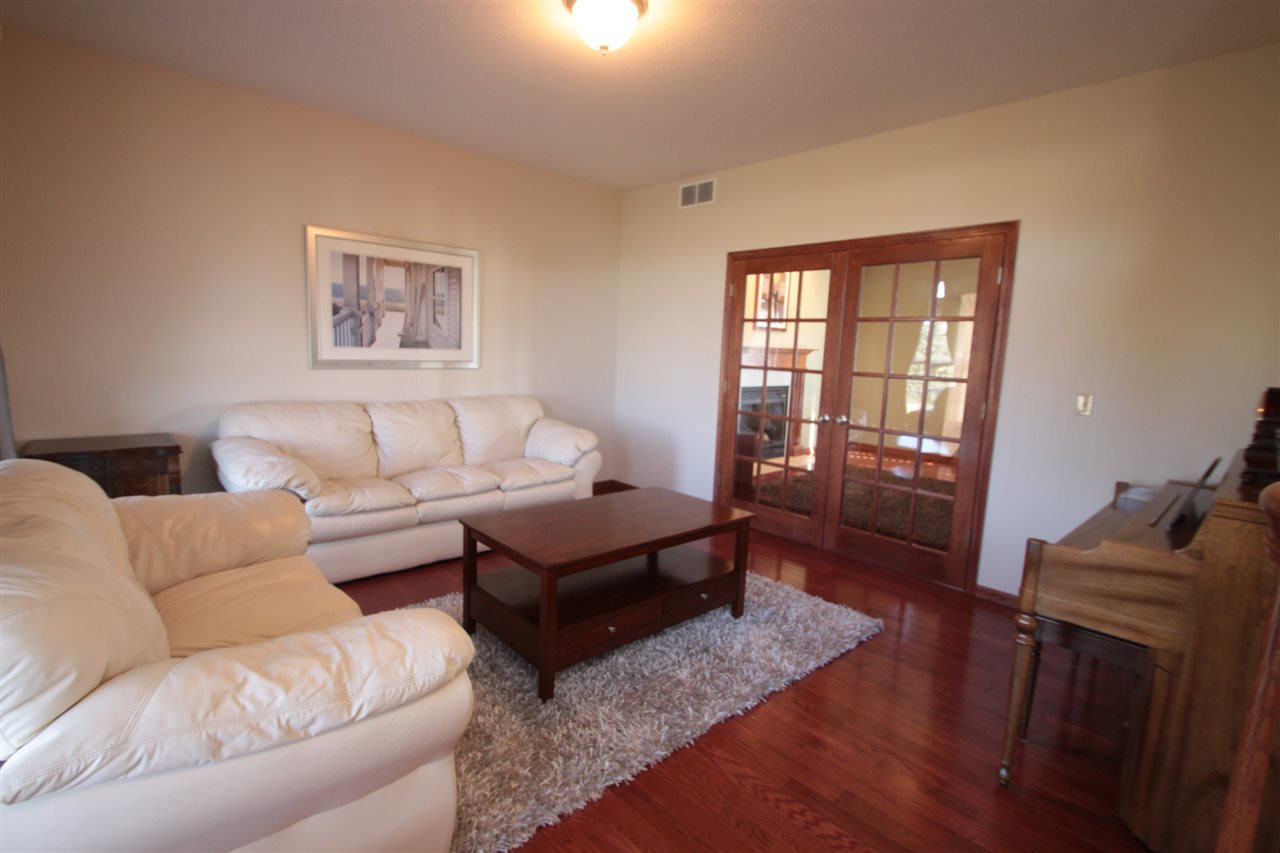 17215 Beaverton Road Capron, IL 61012 - Photo 3 of 25 a living room with furniture and a window