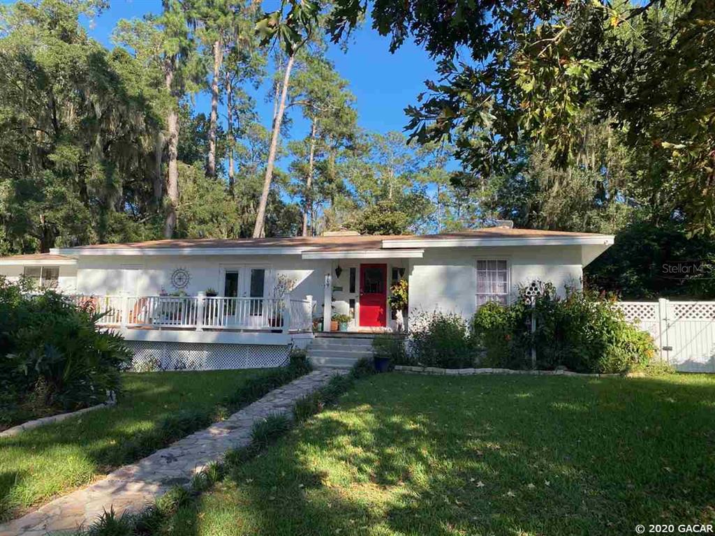 709 Southwest 28 Street Gainesville, FL 32607 - Photo 1 of 1 a front view of house with yard and green space