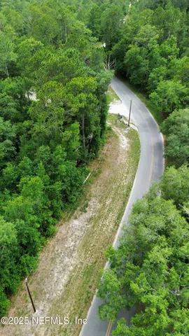 a view of a yard with a house