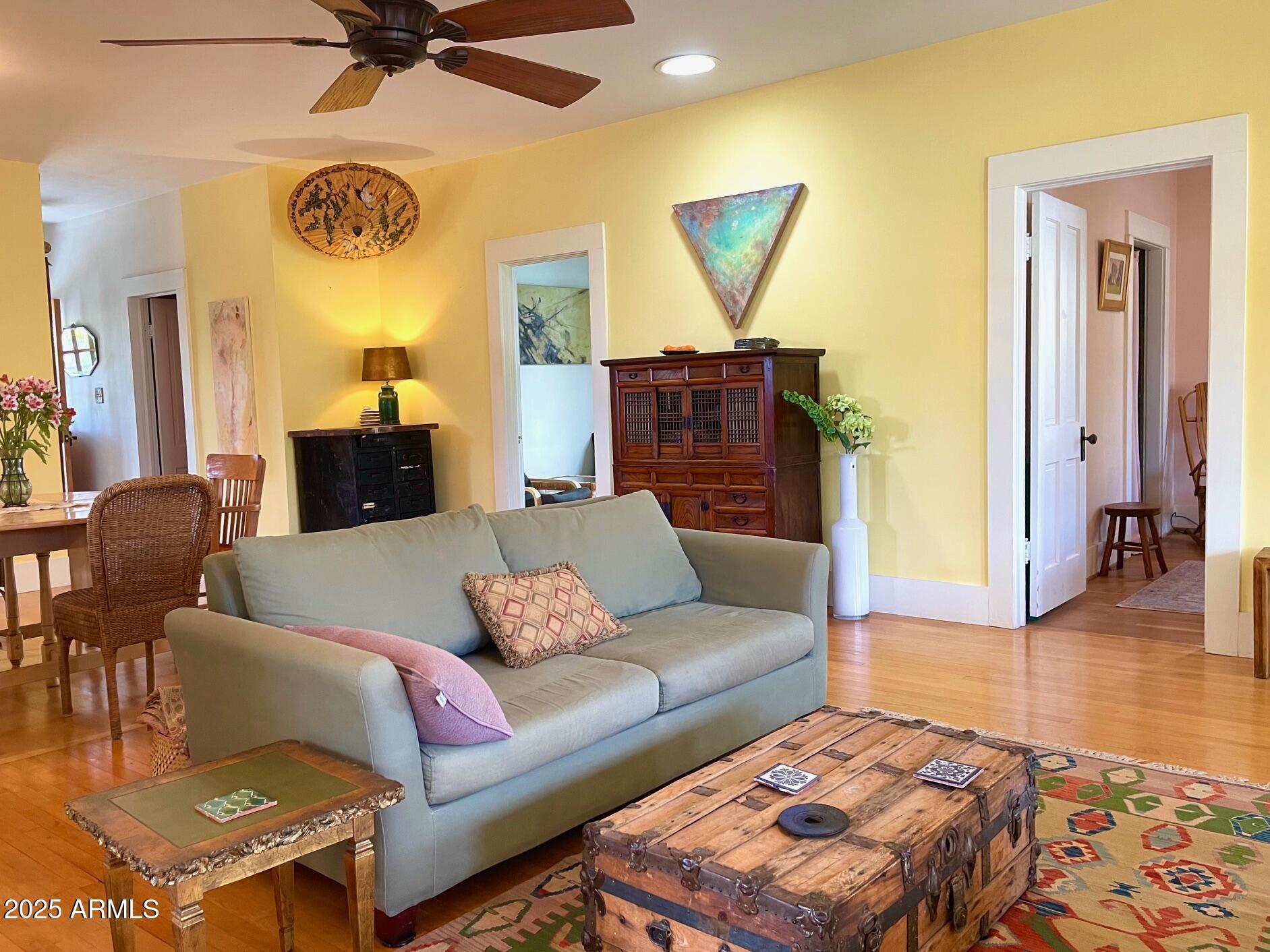 5 Old Douglas Road Bisbee, AZ 85603 - Photo 21 of 35 a living room with furniture and a wooden floor