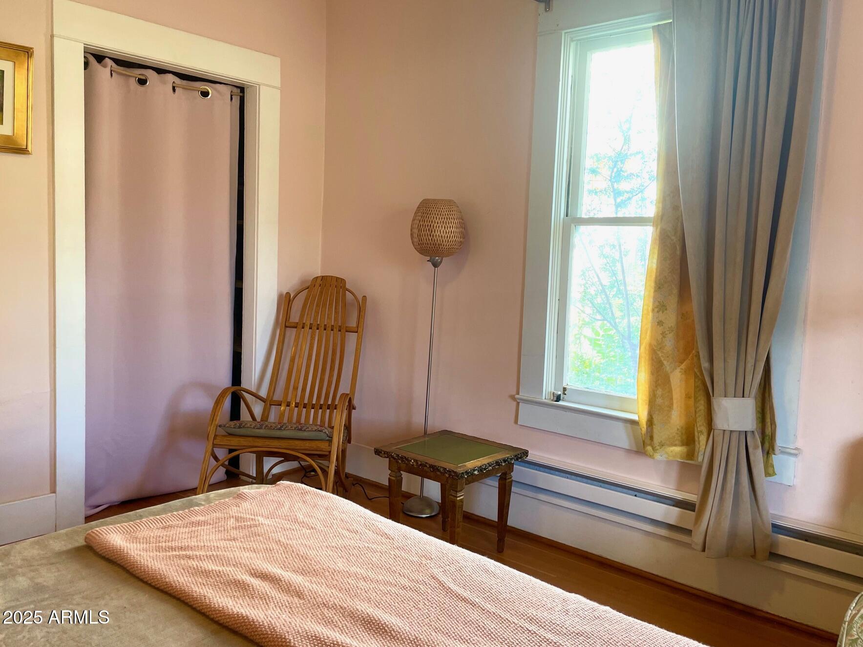 5 Old Douglas Road Bisbee, AZ 85603 - Photo 24 of 35 a bedroom with a bed and a window