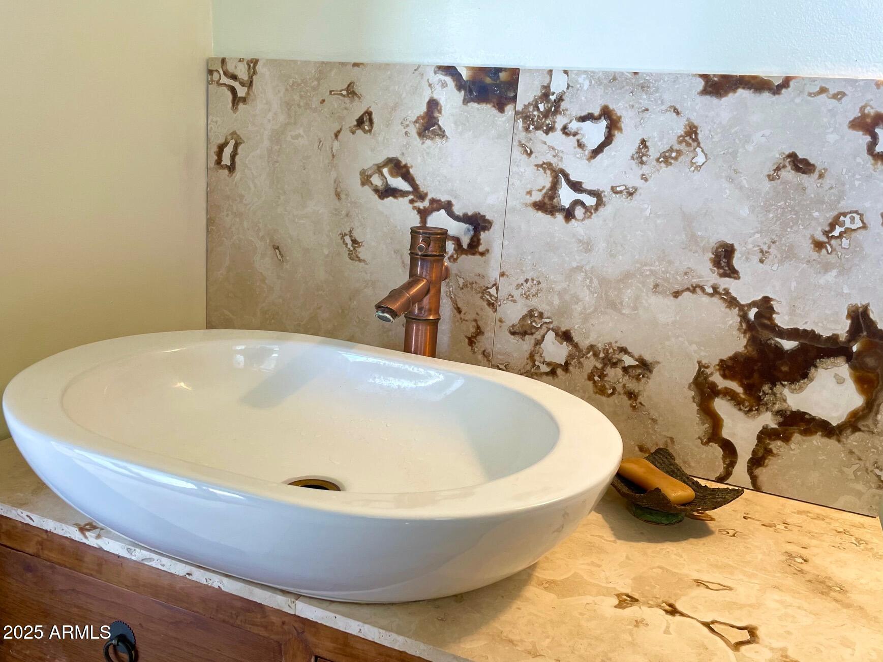 5 Old Douglas Road Bisbee, AZ 85603 - Photo 29 of 35 a white bath tub sitting in a bathroom