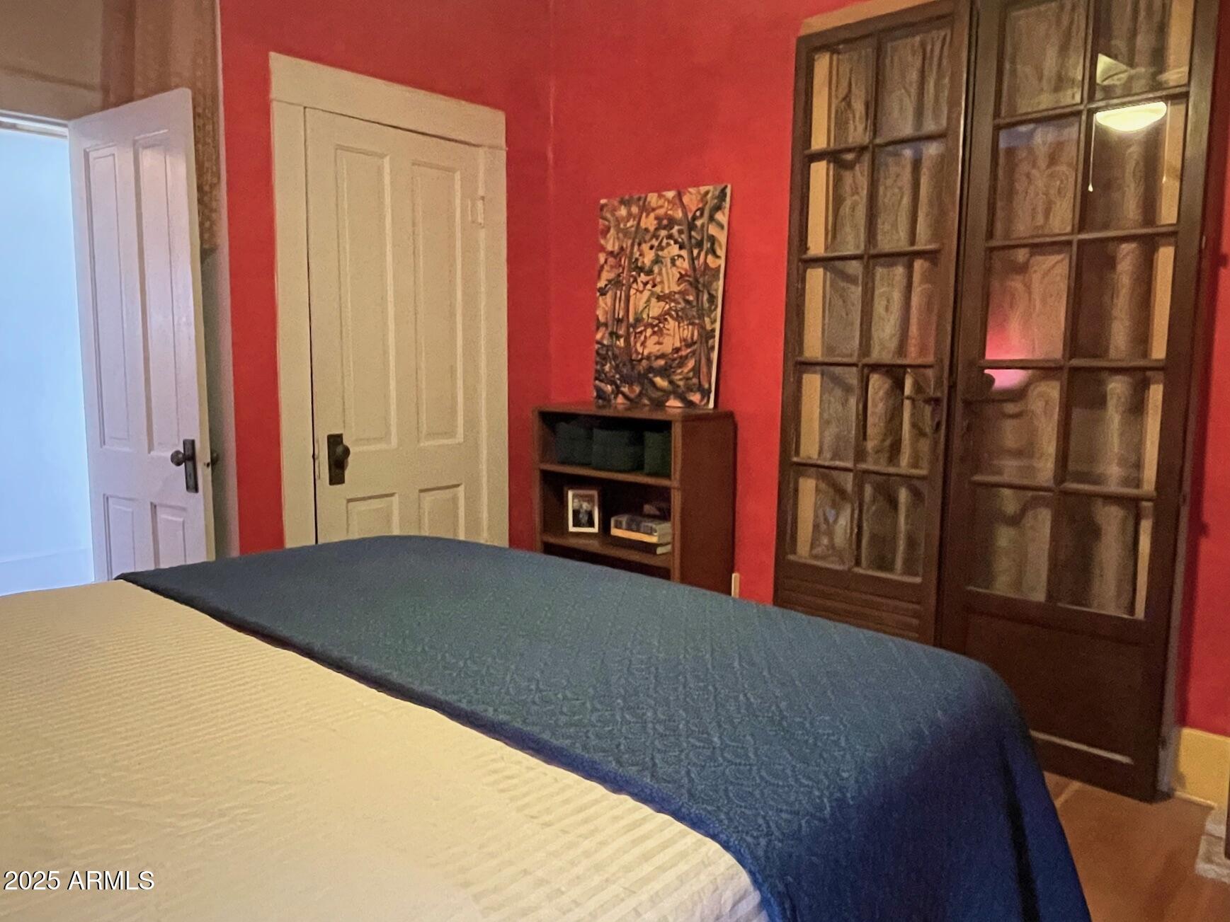 5 Old Douglas Road Bisbee, AZ 85603 - Photo 31 of 35 a bedroom with a bed and a window