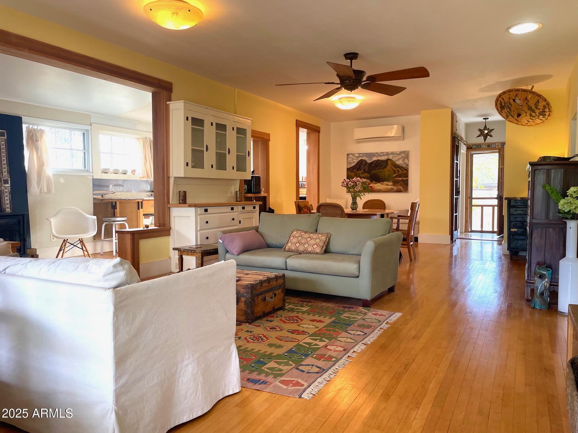 5 Old Douglas Road Bisbee, AZ 85603 - Photo 8 of 35 a living room with furniture and a wooden floor