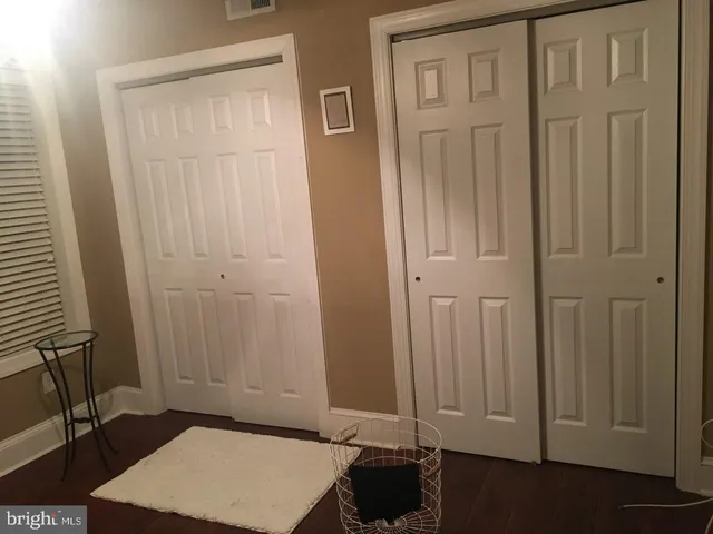 a room with furniture and a window