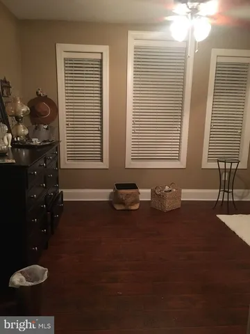 a stove top oven sitting inside of a kitchen