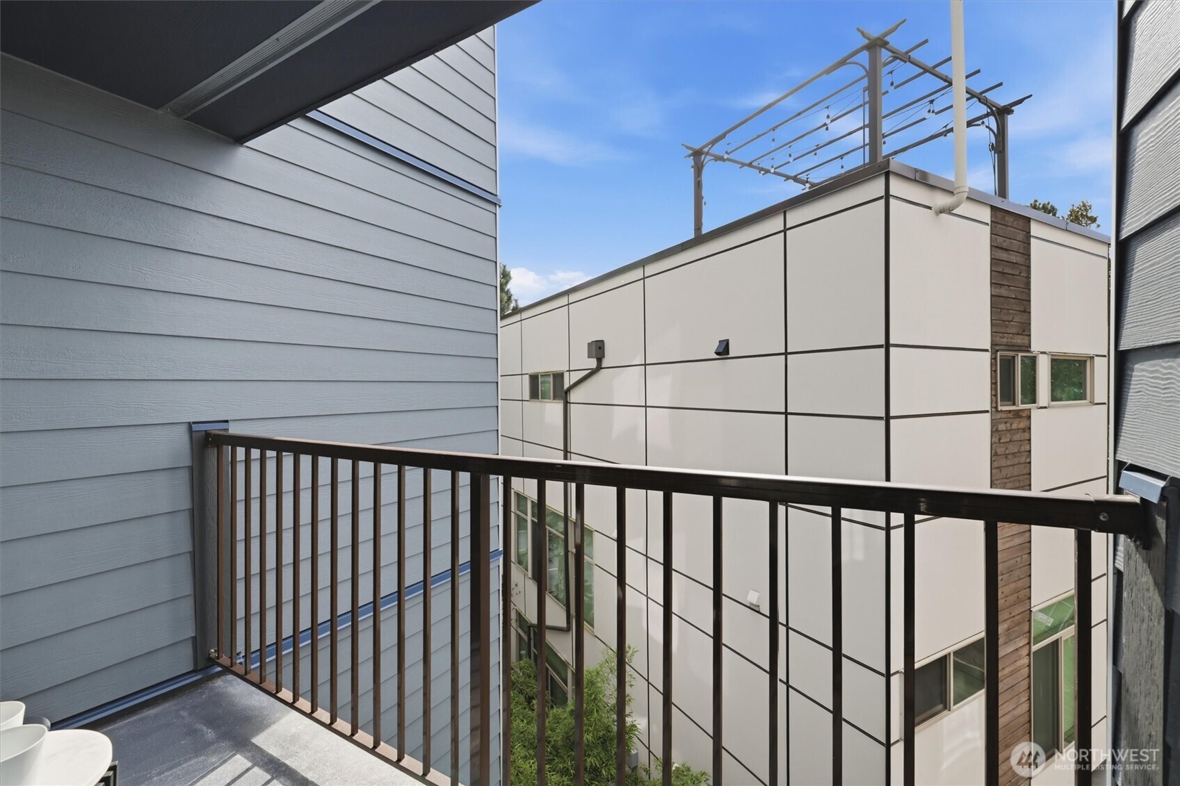 3045 20th Avenue West, Unit 303 Seattle, WA 98199 - Photo 22 of 28 a view of a wrought fence