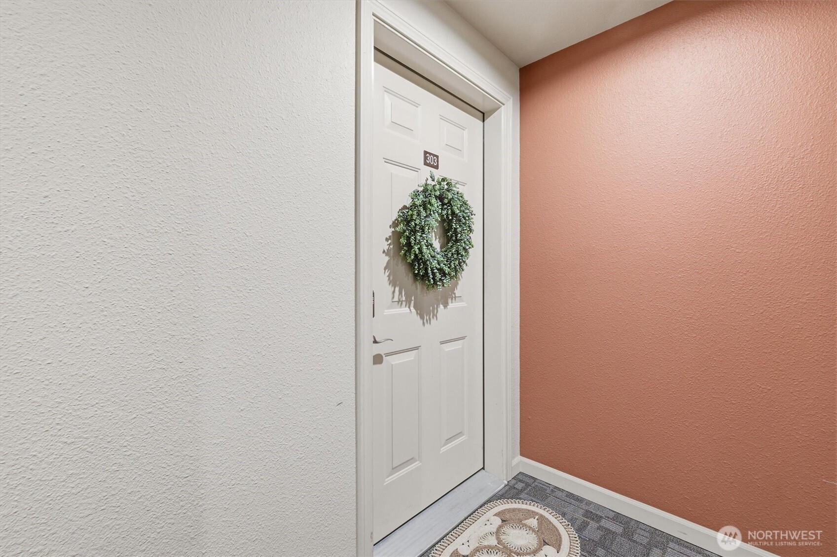 3045 20th Avenue West, Unit 303 Seattle, WA 98199 - Photo 5 of 28 a view of a hallway