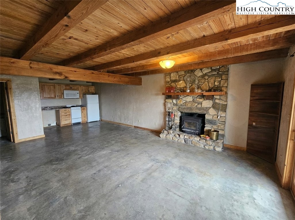 480 Schoolhouse Ridge Boone, NC 28607 - Photo 36 of 47 a view of a livingroom with a fireplace