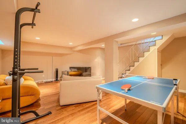 a kitchen with a sink appliances and cabinets