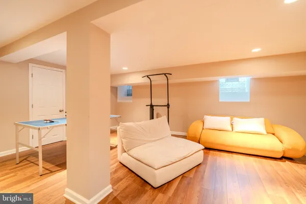 a bedroom with a bed and a night stand