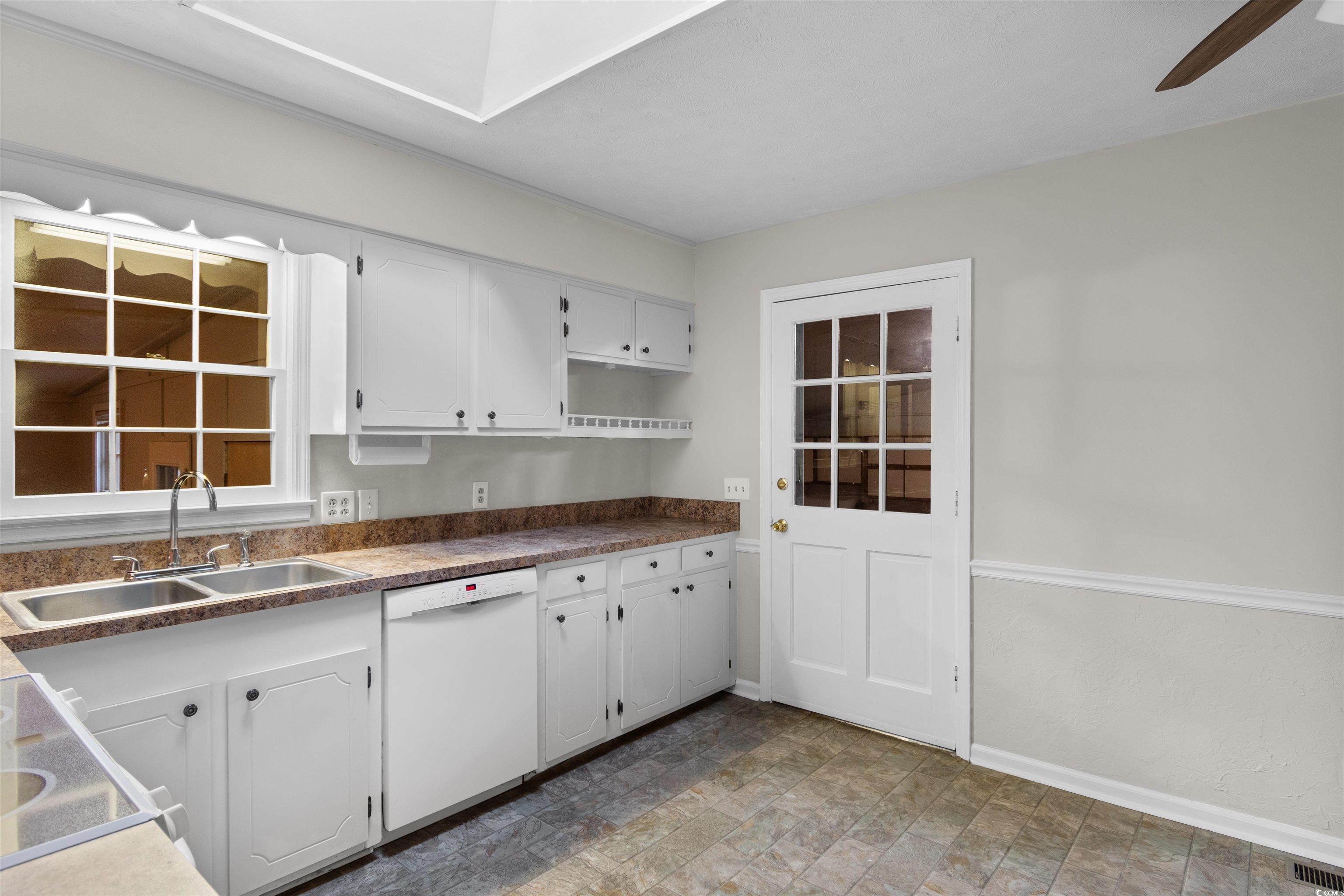 3870 Woodchuck Road Myrtle Beach, SC 29579 - Photo 7 of 32 Kitchen featuring dishwasher, sink, ceiling fan, a