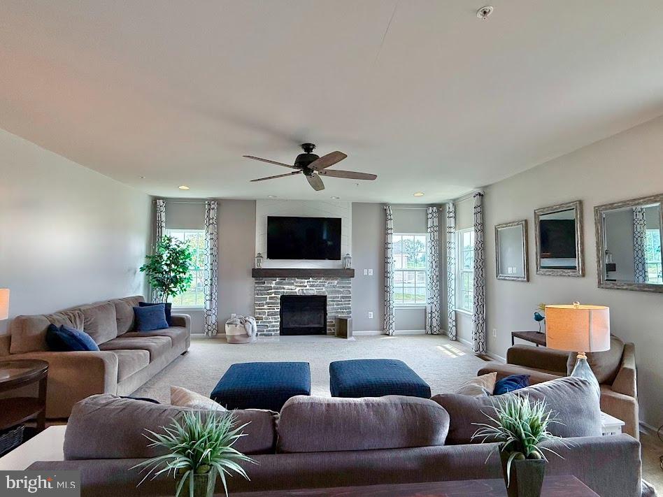 3012 Wasatch View Drive Frederick, MD 21704 - Photo 13 of 54 a living room with furniture fireplace and a flat screen tv