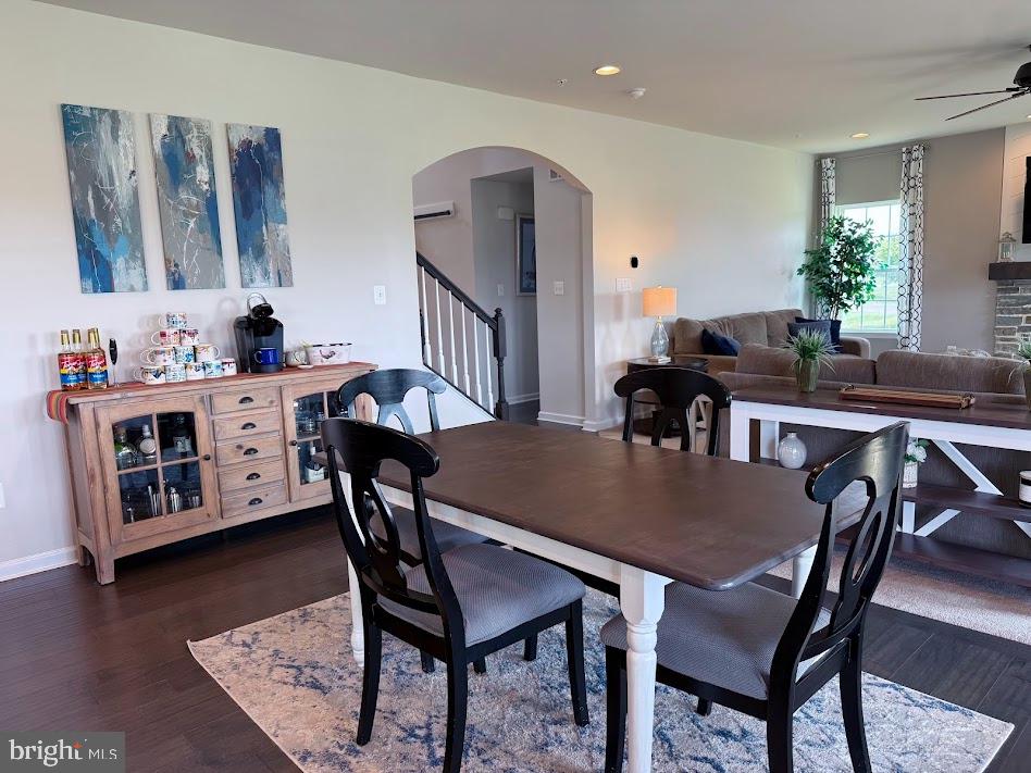 3012 Wasatch View Drive Frederick, MD 21704 - Photo 15 of 54 a view of a dining room with furniture and wooden floor