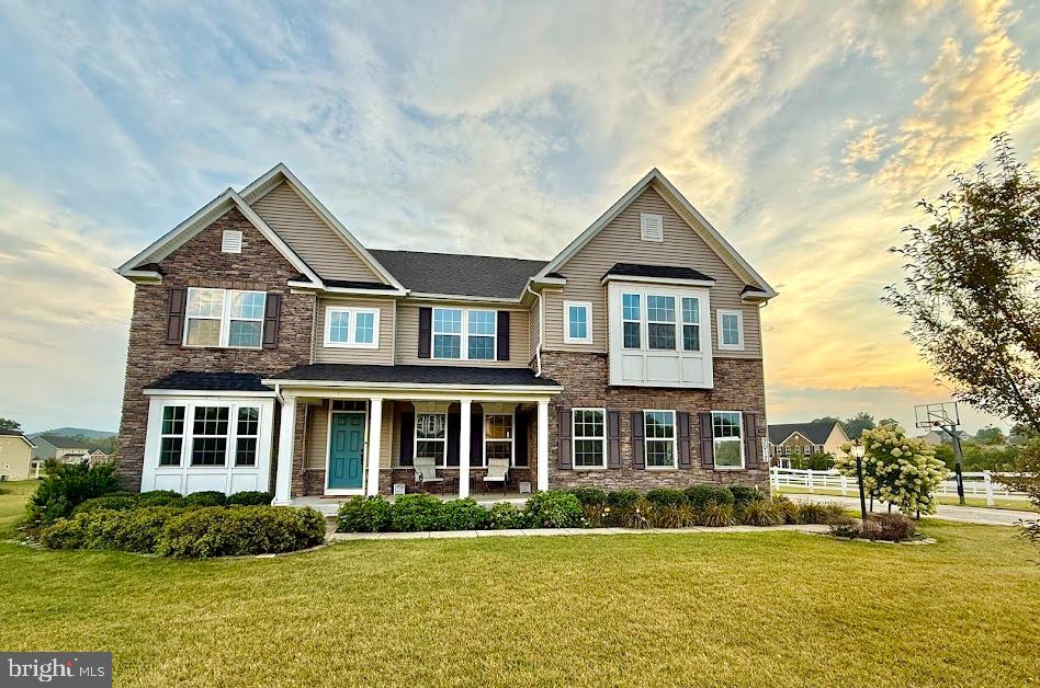 3012 Wasatch View Drive Frederick, MD 21704 - Photo 2 of 54 a front view of a house with a yard