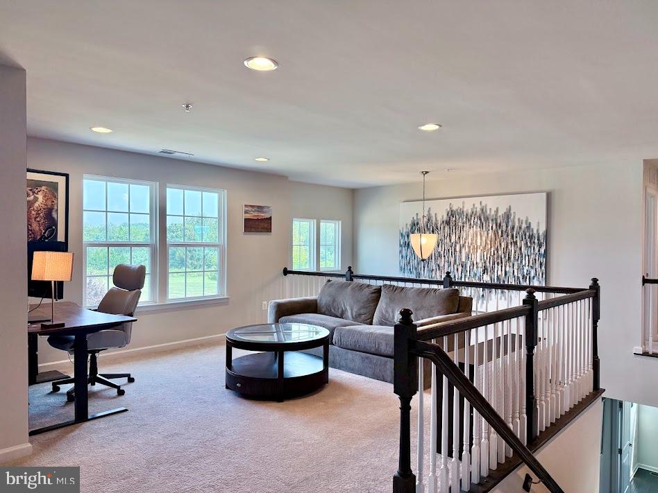3012 Wasatch View Drive Frederick, MD 21704 - Photo 24 of 54 a living room with furniture and a large window
