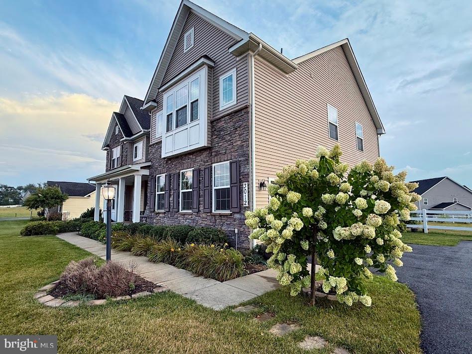 3012 Wasatch View Drive Frederick, MD 21704 - Photo 3 of 54 a front view of a house with a yard