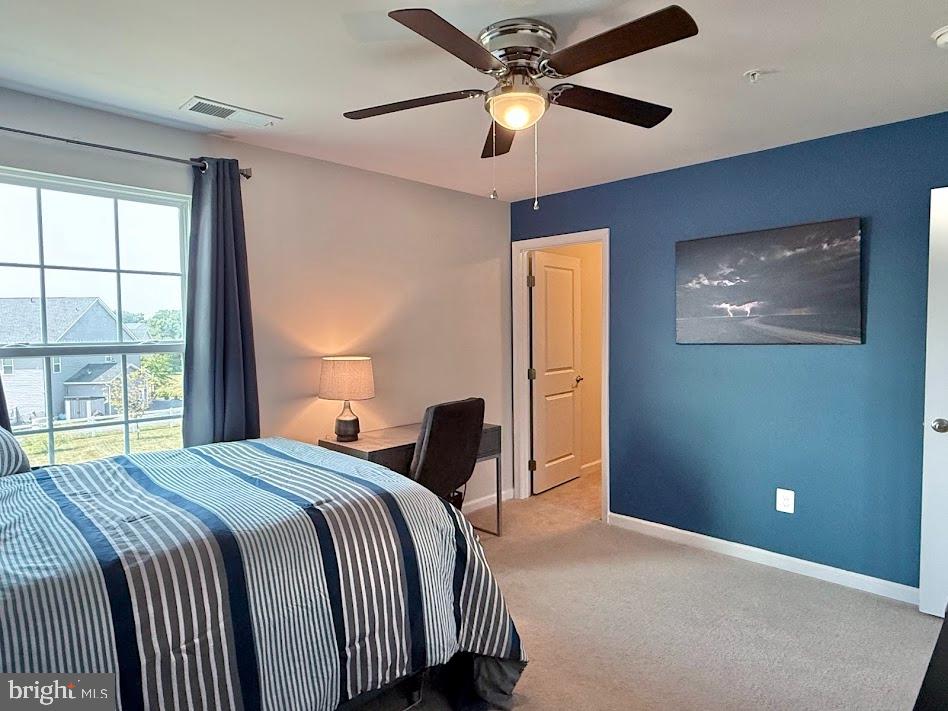 3012 Wasatch View Drive Frederick, MD 21704 - Photo 35 of 54 a bedroom with a large bed and a window