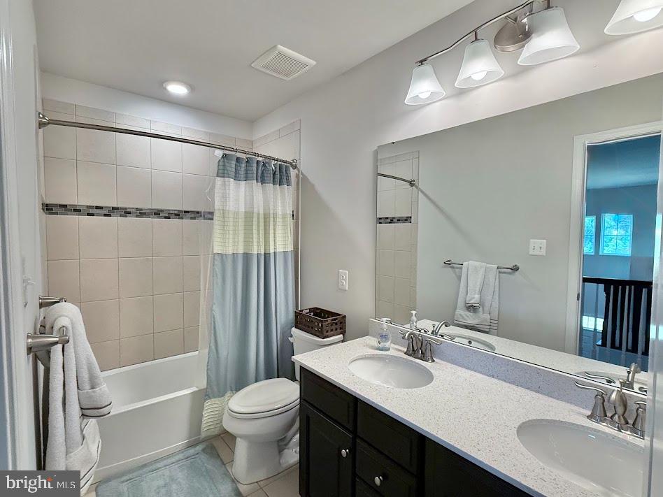 3012 Wasatch View Drive Frederick, MD 21704 - Photo 39 of 54 a bathroom with a sink a toilet and shower