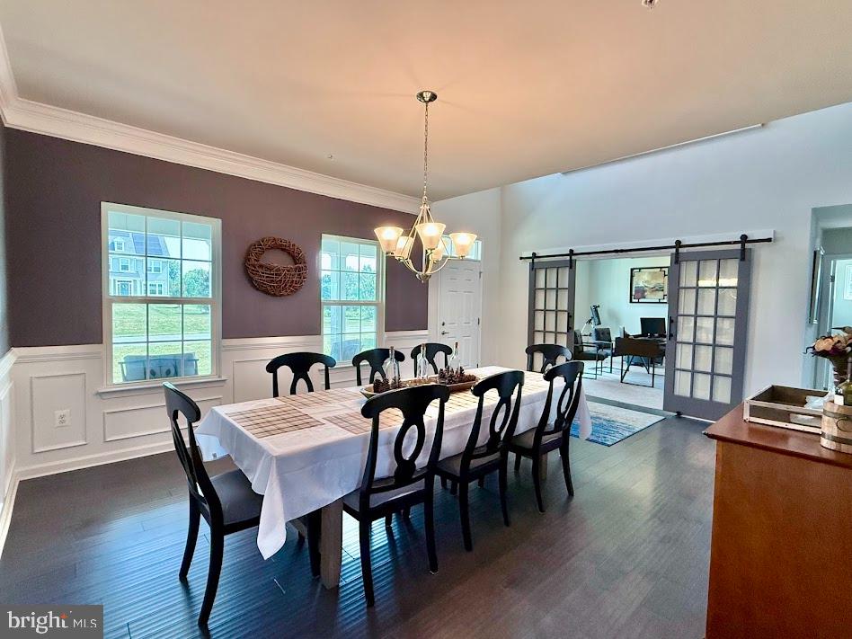 3012 Wasatch View Drive Frederick, MD 21704 - Photo 7 of 54 a view of a a dining room with furniture window and wooden floor