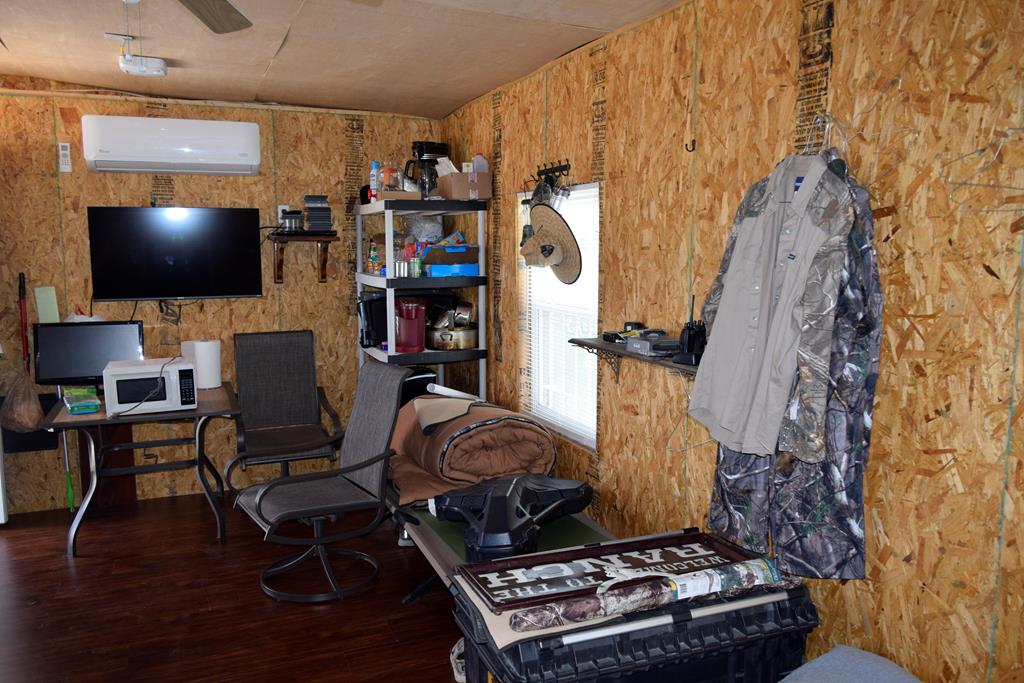 2523 Southwest St Rocksprings Tx 78880 Del Rio, TX 78840 - Photo 16 of 80 a living room with furniture and a flat screen tv