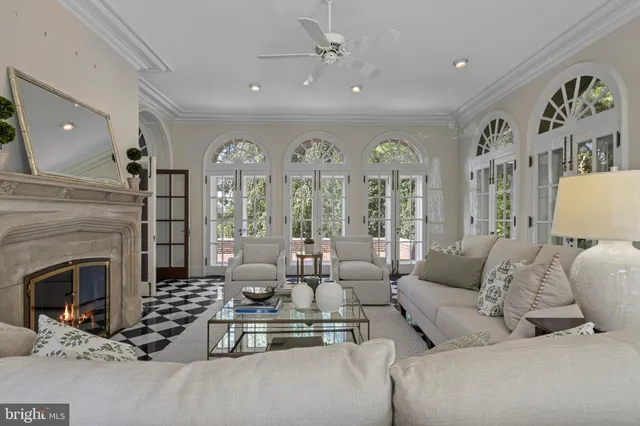 a view of a dining room with furniture and window