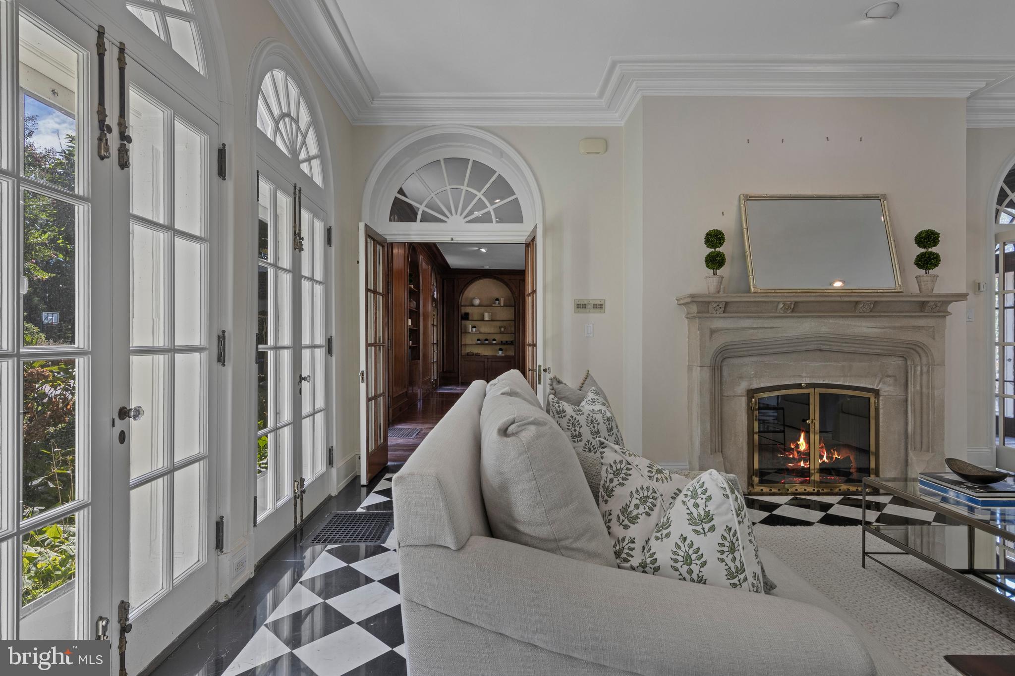717 North Spring Mill Road Villanova, PA 19085 - Photo 14 of 62 a living room with furniture and a fireplace